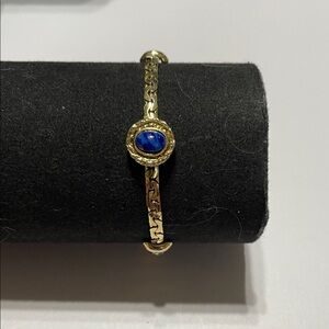 Gold Bracelet with Blue Stone Center